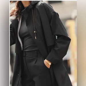 NWT Rhône Tens women’s black long Raincoat sz M